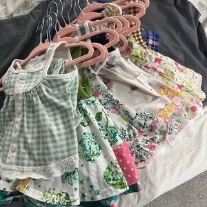 Newborn lot of Sweethoney dresses and sets.